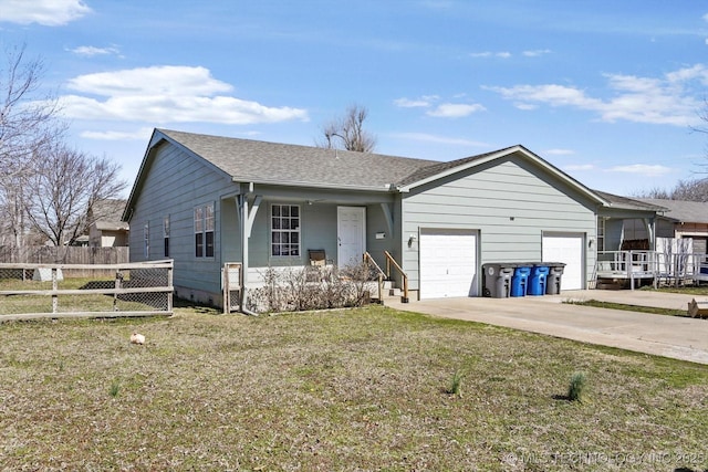 ranch-style home with an attached garage, a shingled roof, fence, driveway, and a front yard