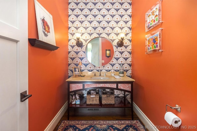 49721 E 95th Rd, Miami, OK 74354 - bathroom featuring vanity and baseboards