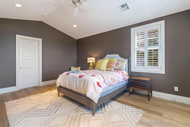 49721 E 95th Rd, Miami, OK 74354 - bedroom with visible vents, wood finished floors, baseboards, and vaulted ceiling