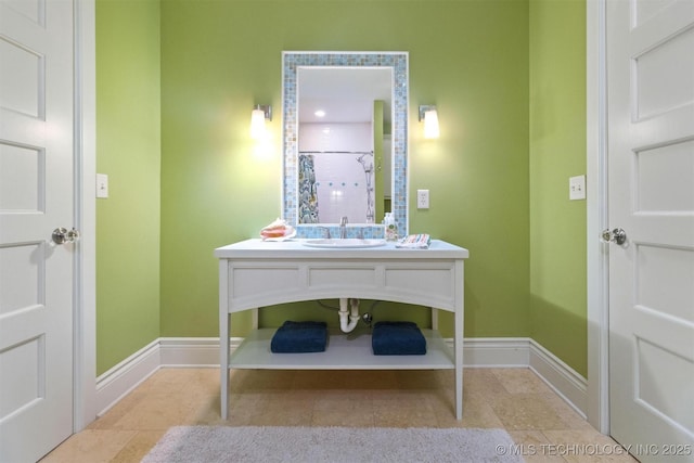49721 E 95th Rd, Miami, OK 74354 - bathroom featuring baseboards, walk in shower, vanity, and tile patterned flooring