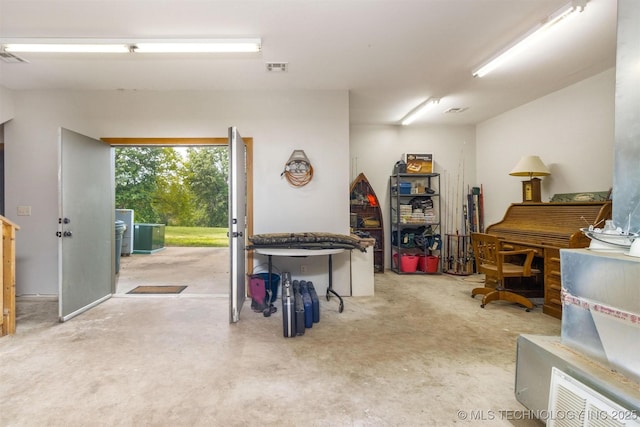 49721 E 95th Rd, Miami, OK 74354 - garage with visible vents