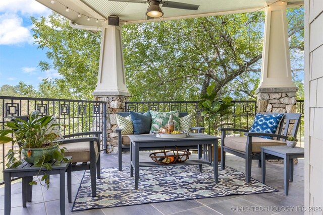 49721 E 95th Rd, Miami, OK 74354 - balcony featuring an outdoor living space and ceiling fan