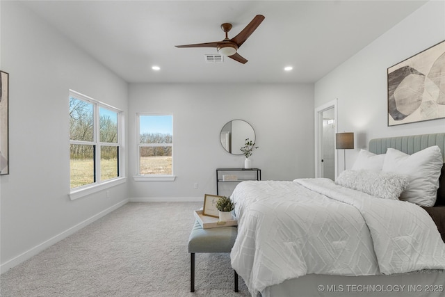 bedroom with baseboards, visible vents, ceiling fan, carpet floors, and recessed lighting