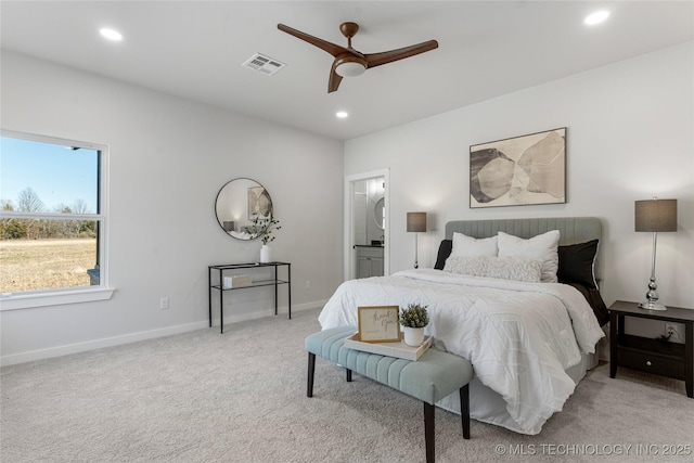 bedroom with connected bathroom, recessed lighting, light carpet, visible vents, and baseboards