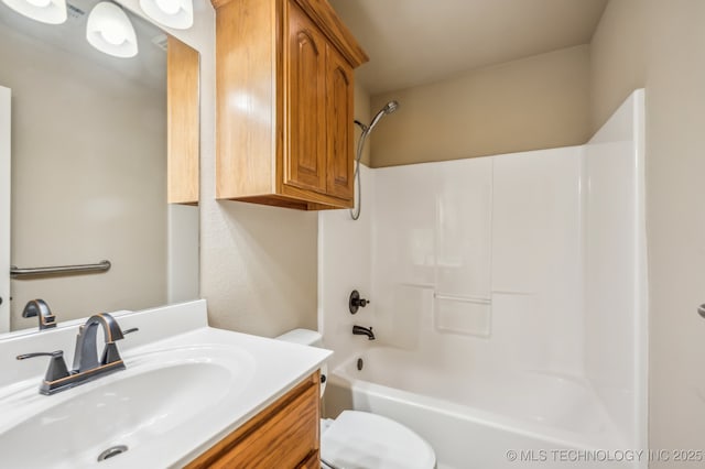 full bath featuring shower / bath combination, vanity, and toilet