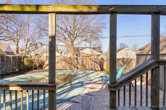 exterior space featuring a fenced backyard