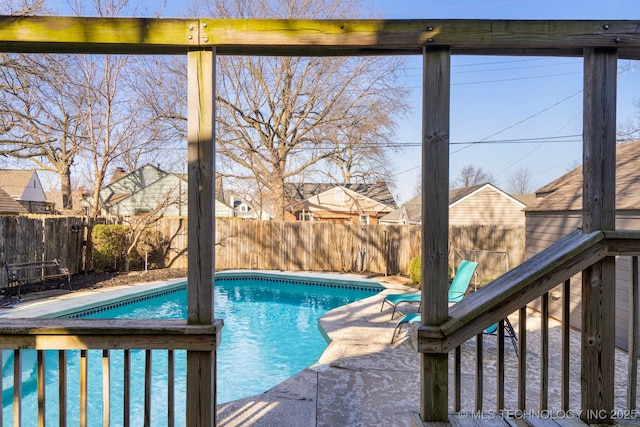 view of pool featuring a fenced in pool and a fenced backyard