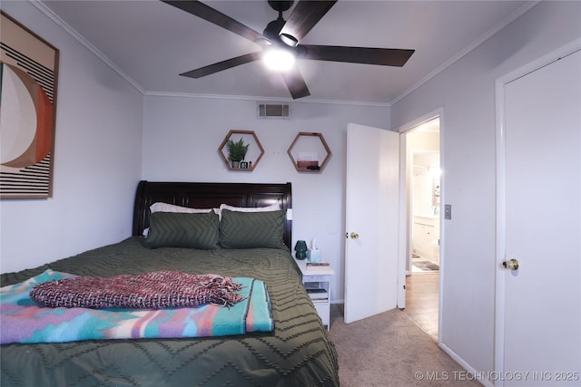 bedroom featuring crown molding, visible vents, ceiling fan, and carpet flooring