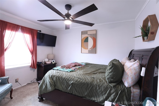 carpeted bedroom featuring ornamental molding, multiple windows, and ceiling fan