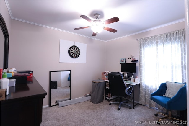 carpeted office space featuring ornamental molding, baseboards, and a ceiling fan