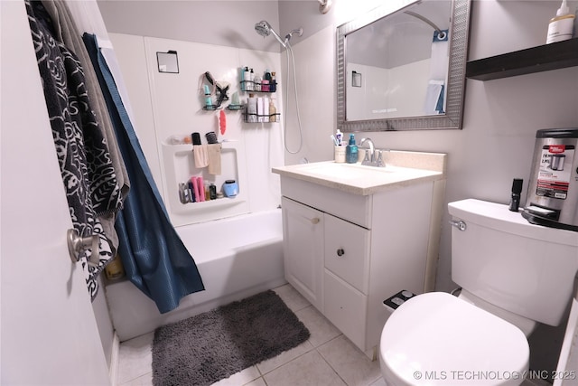 bathroom featuring toilet, shower / tub combo, vanity, and tile patterned floors