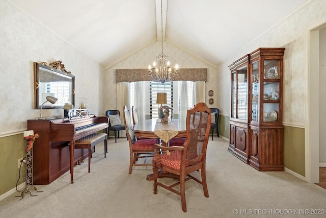 carpeted dining area featuring ornamental molding, vaulted ceiling with beams, baseboards, and an inviting chandelier