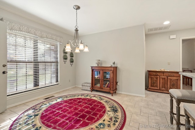 interior space featuring a chandelier, visible vents, baseboards, and light tile patterned floors