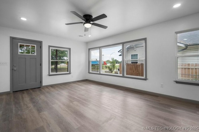 foyer featuring recessed lighting, baseboards, and wood finished floors