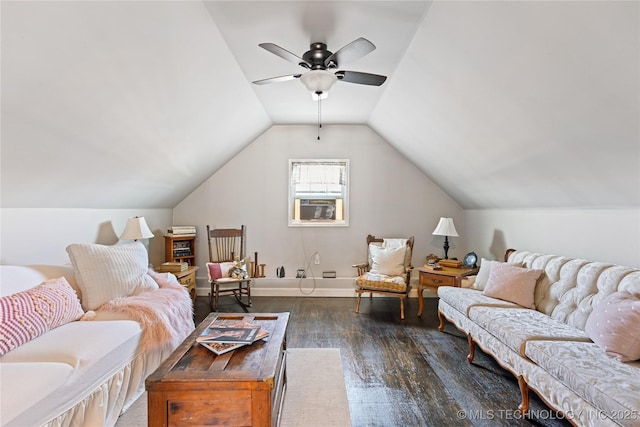 living room featuring vaulted ceiling, baseboards, a ceiling fan, and wood finished floors