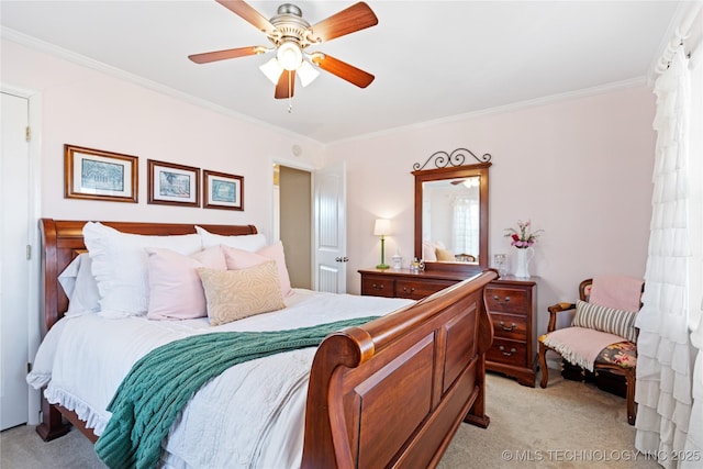 bedroom with light carpet, ornamental molding, and a ceiling fan