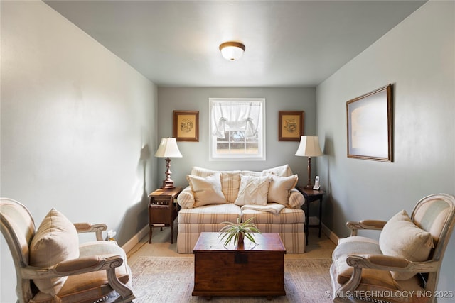 living room featuring baseboards