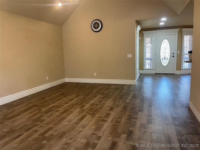 entryway with lofted ceiling, recessed lighting, dark wood-style floors, and baseboards