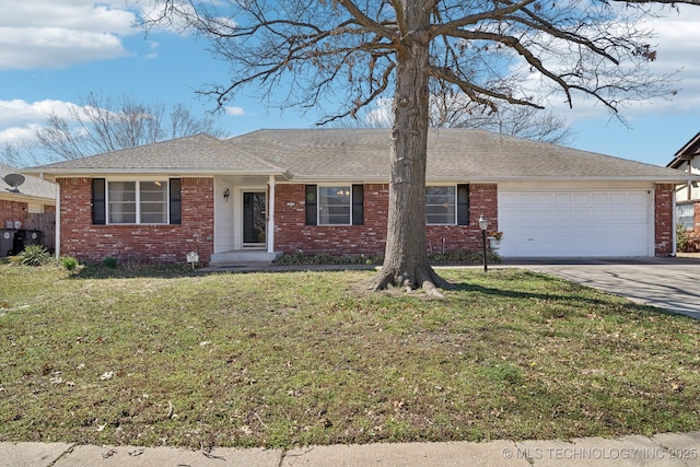 ranch-style house featuring a garage, a front yard, brick siding, and driveway