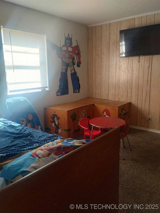 carpeted bedroom with wooden walls