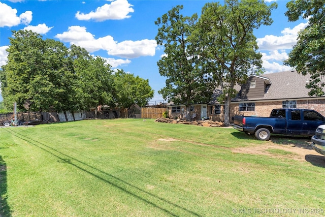 view of yard featuring fence