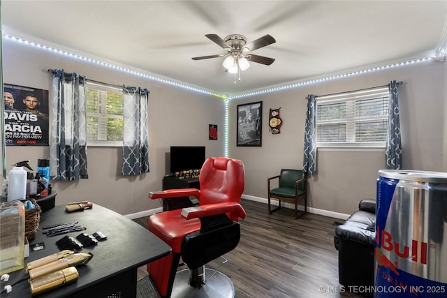 home office featuring ceiling fan, baseboards, and wood finished floors