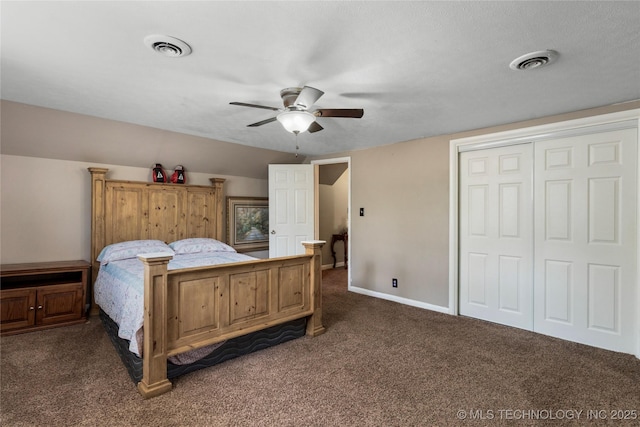 carpeted bedroom with visible vents, baseboards, a closet, and a ceiling fan