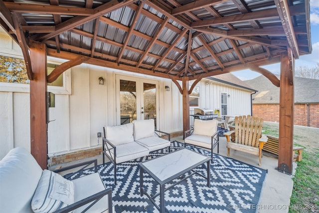 view of patio / terrace with a gazebo, a grill, an outdoor hangout area, and french doors