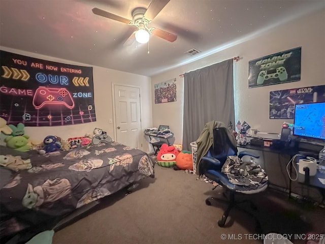 carpeted bedroom featuring visible vents and ceiling fan