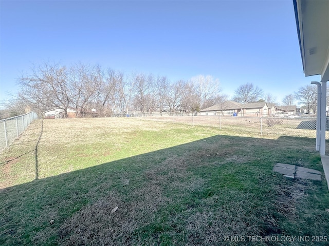 view of yard with a fenced backyard