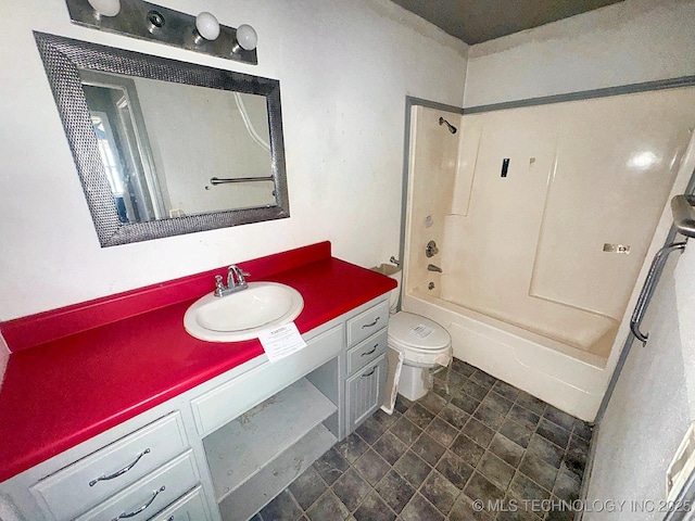 bathroom with washtub / shower combination, toilet, and vanity