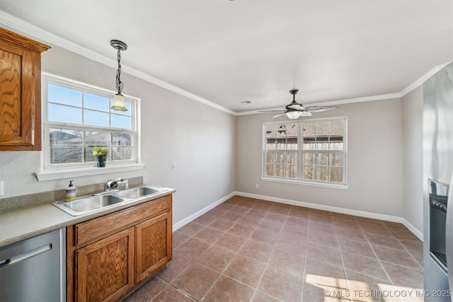 kitchen with a sink, brown cabinets, stainless steel dishwasher, and ornamental molding