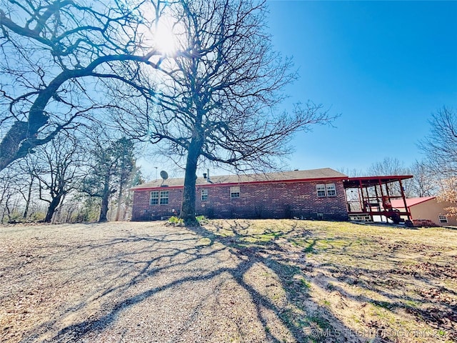 back of property with brick siding