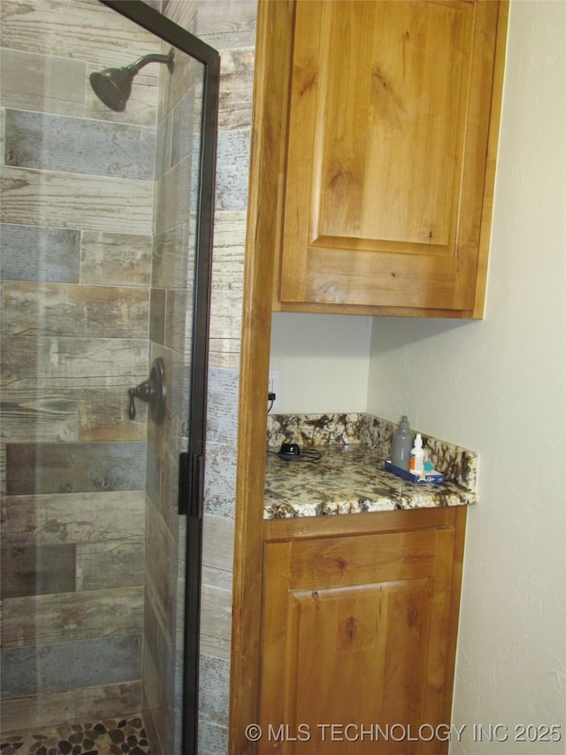 interior space featuring a shower stall