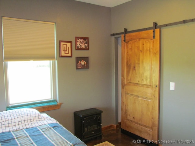 bedroom with a barn door