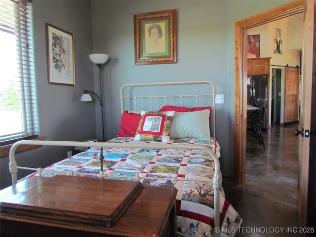 bedroom featuring finished concrete flooring