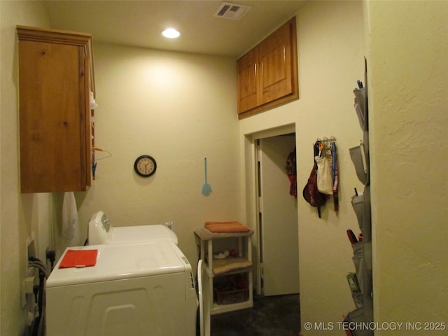 laundry area with recessed lighting, cabinet space, visible vents, and washing machine and clothes dryer