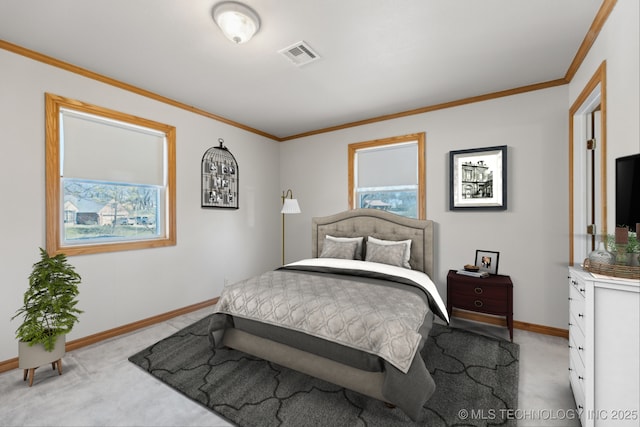 bedroom with visible vents, light carpet, baseboards, and ornamental molding