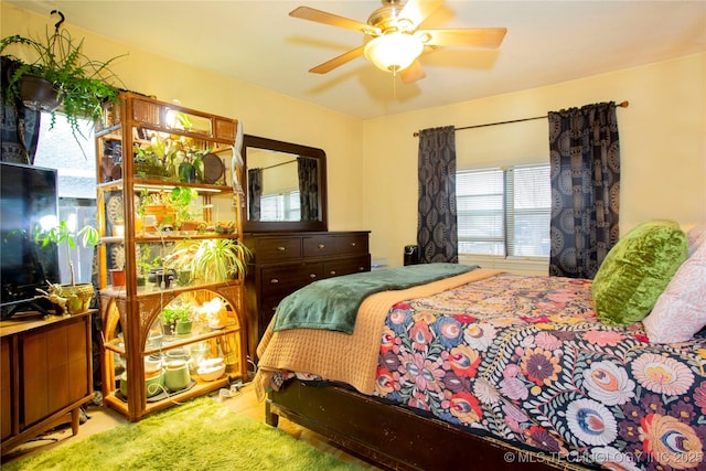 bedroom featuring ceiling fan