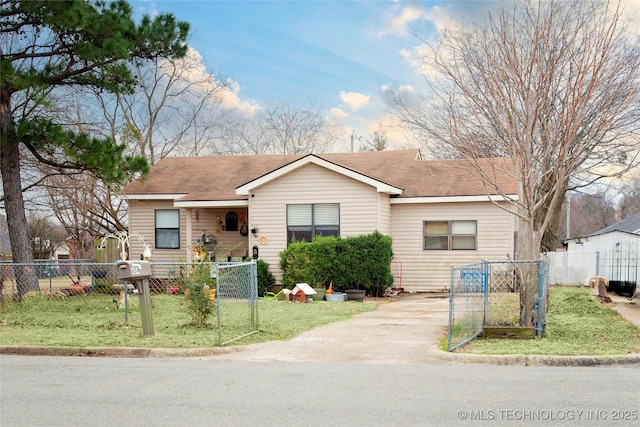 ranch-style house with a front yard and a fenced front yard