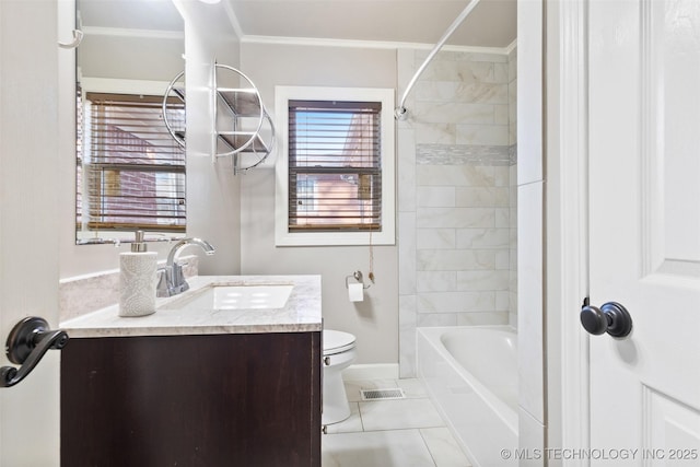 bathroom with visible vents, toilet, crown molding, baseboards, and vanity