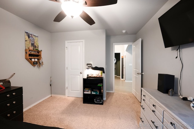 5117 S Nassau Ave, Sand Springs, OK 74063 - carpeted bedroom with baseboards and a ceiling fan