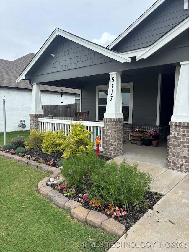 5117 S Nassau Ave, Sand Springs, OK 74063 - view of front of house featuring covered porch