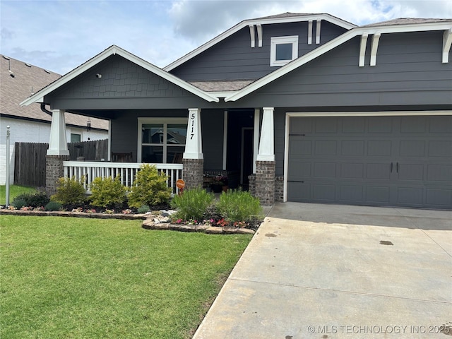 5117 S Nassau Ave, Sand Springs, OK 74063 - craftsman-style home with a porch, driveway, and an attached garage