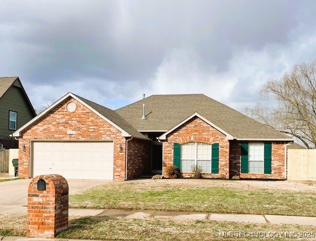 view of front of home with brick siding, an attached garage, concrete driveway, and fence