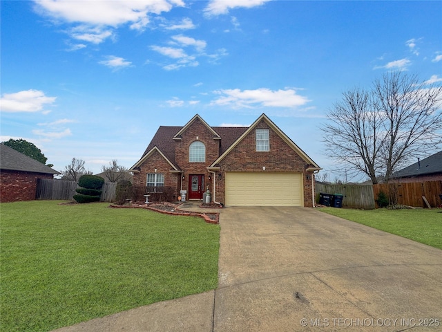 traditional-style house featuring brick siding, an attached garage, fence, a front yard, and driveway