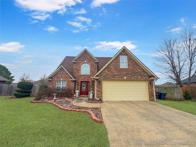 traditional-style home with a front yard, fence, and brick siding