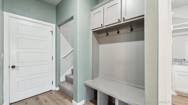 mudroom with light wood-type flooring