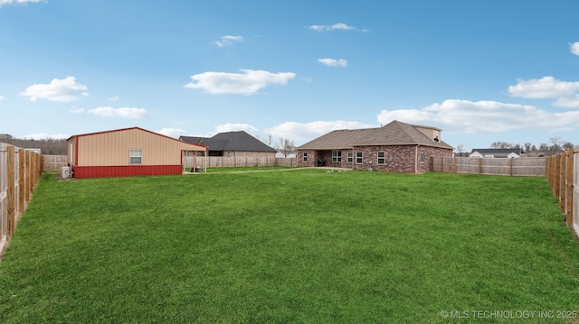 view of yard featuring a fenced backyard