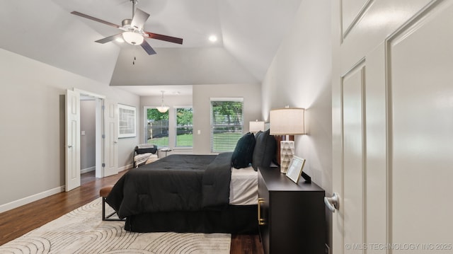 bedroom featuring baseboards, lofted ceiling, wood finished floors, a ceiling fan, and recessed lighting